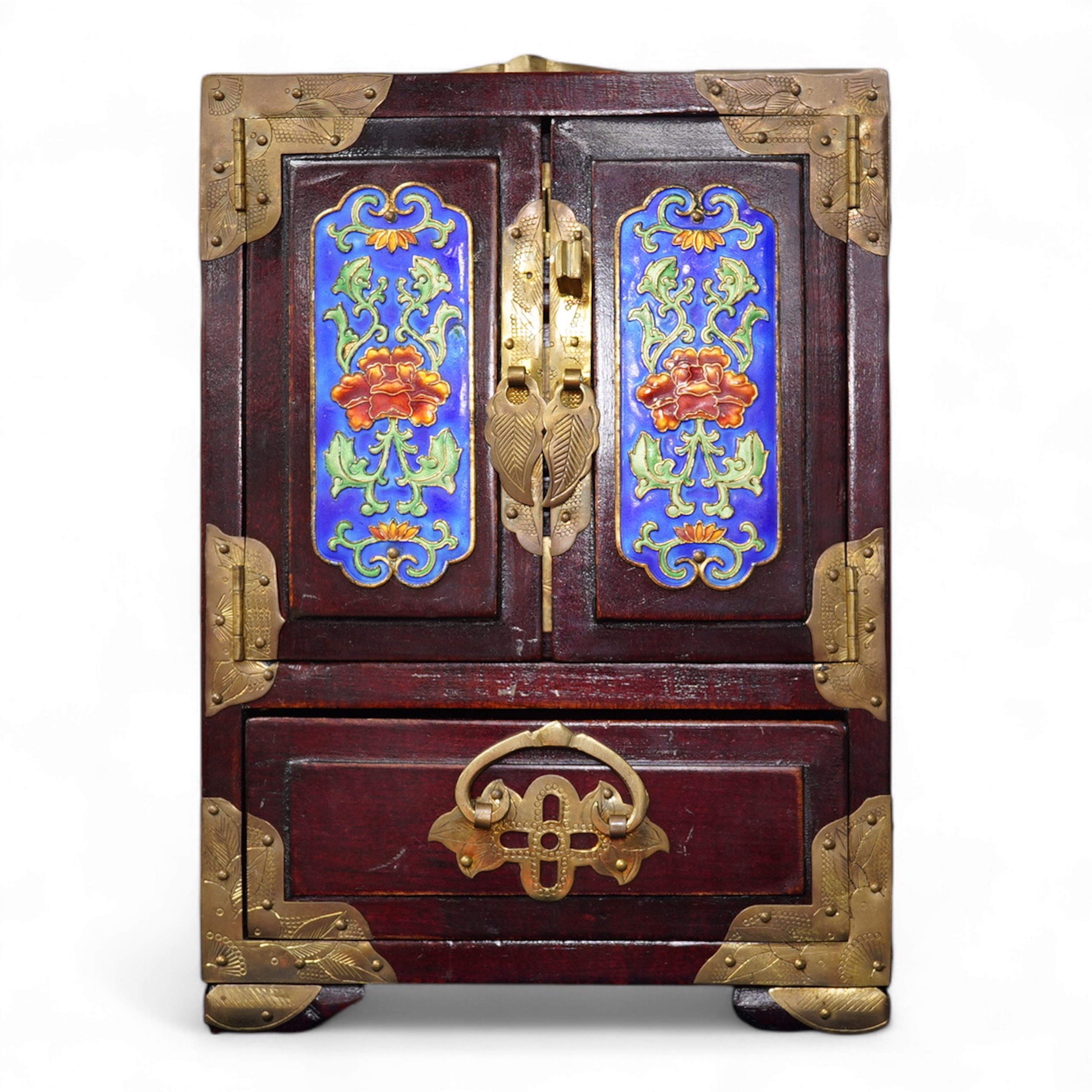 A Chinese brass mounted jewellery cabinet, decorated with enamel plaques. 21cm high. Condition - generally good